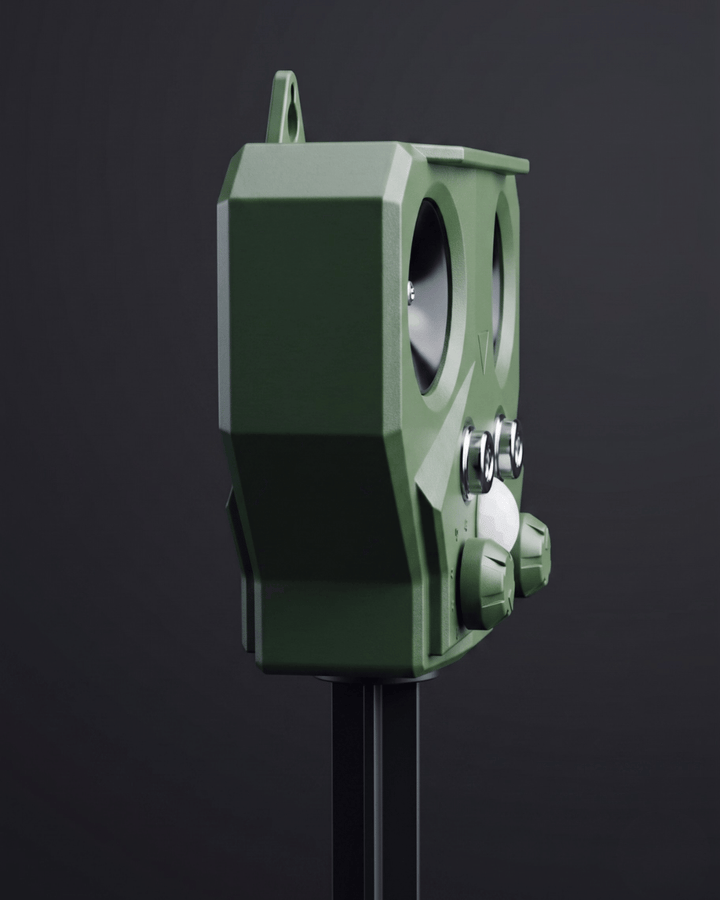 Green electronic device on a black background