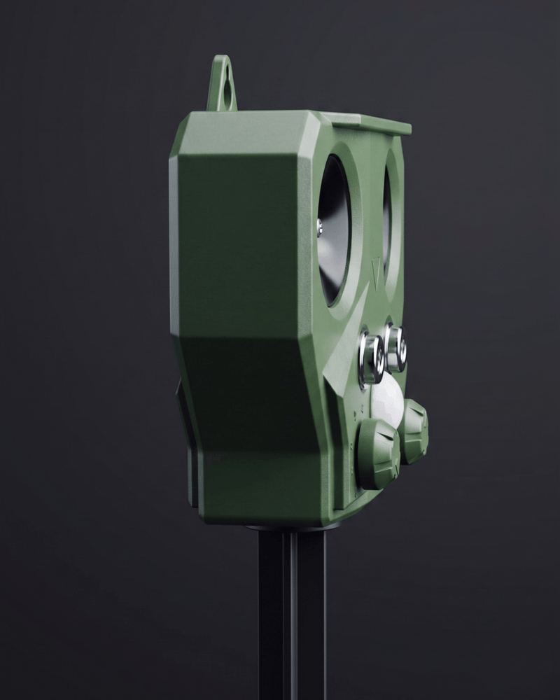 Green electronic device on a black background